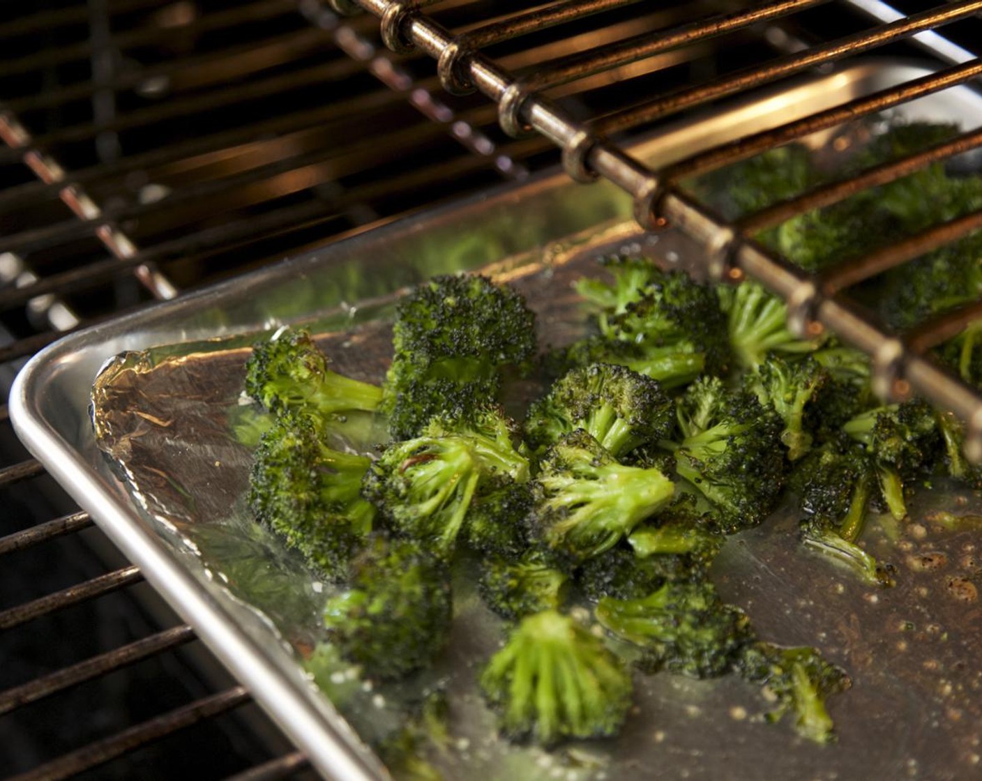 step 12 Place the Broccoli Florets (1 cup) on the sheet pan. Drizzle with Olive Oil (1 Tbsp) and minced garlic, sprinkle Salt (1/4 tsp) over the broccoli and toss. Spread into a single layer and roast in the oven for 15 minutes.
