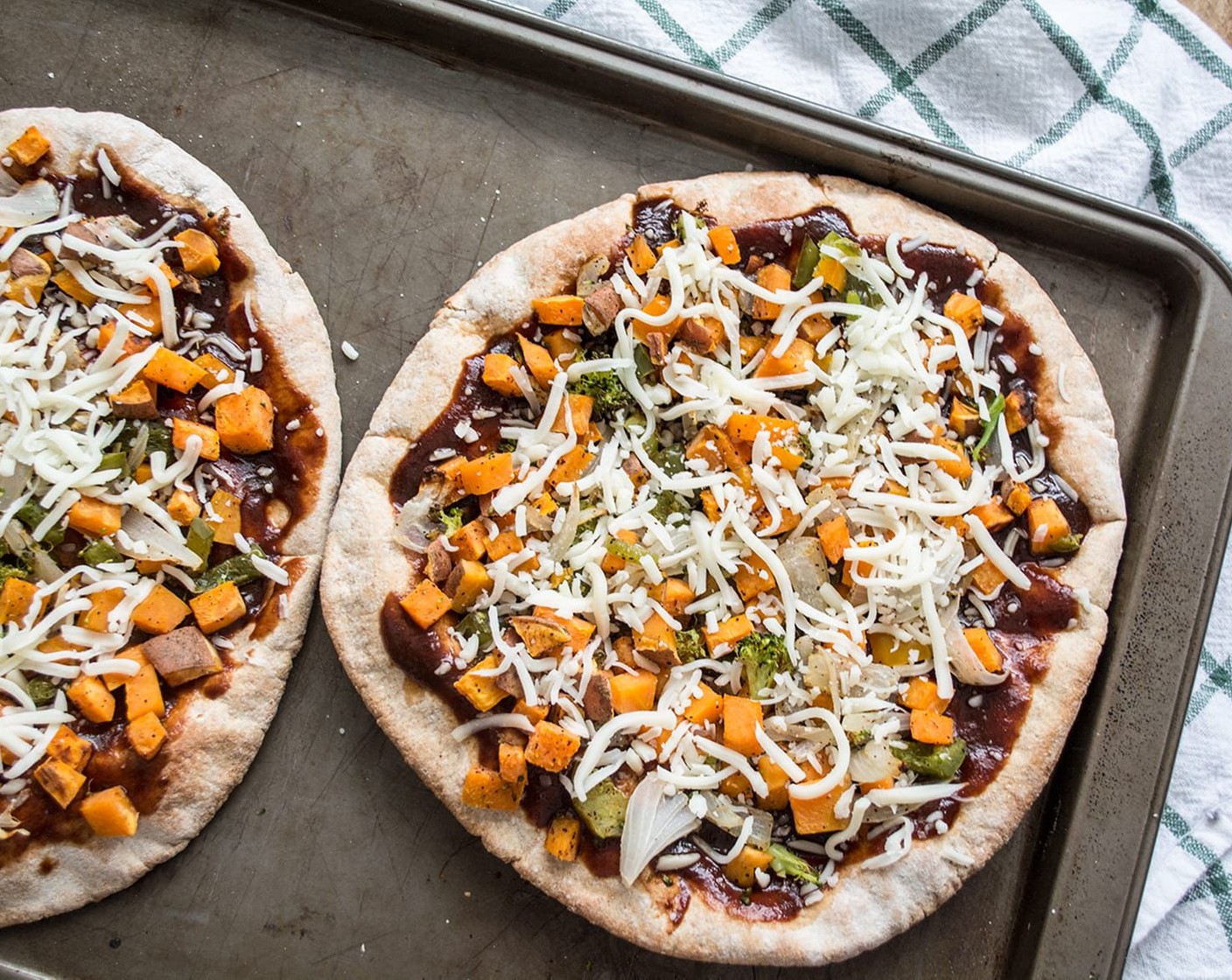 step 8 Top each pita bread with Barbecue Sauce (1/3 cup), then add the roasted veggies, and the top with Mozzarella Cheese (1/4 cup).