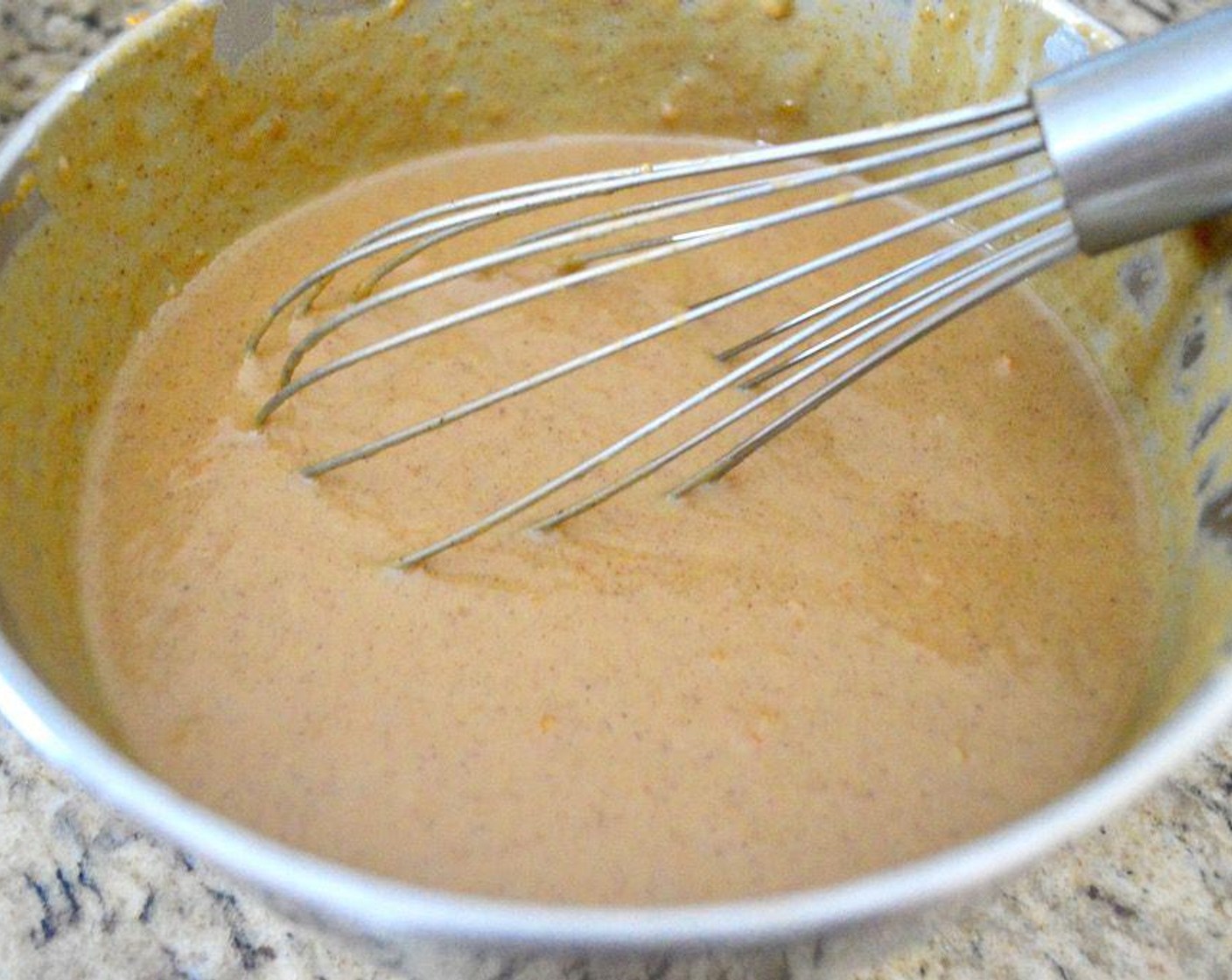 step 9 Add Canned Pumpkin Purée (1 cup), Dark Brown Sugar (1/2 cup), Eggs (2), Sweetened Condensed Milk (1 can), Pumpkin Pie Spice (1/2 Tbsp), Fresh Ginger (1 tsp), and Butter (2 Tbsp) in and whisk it all together thoroughly until smooth.