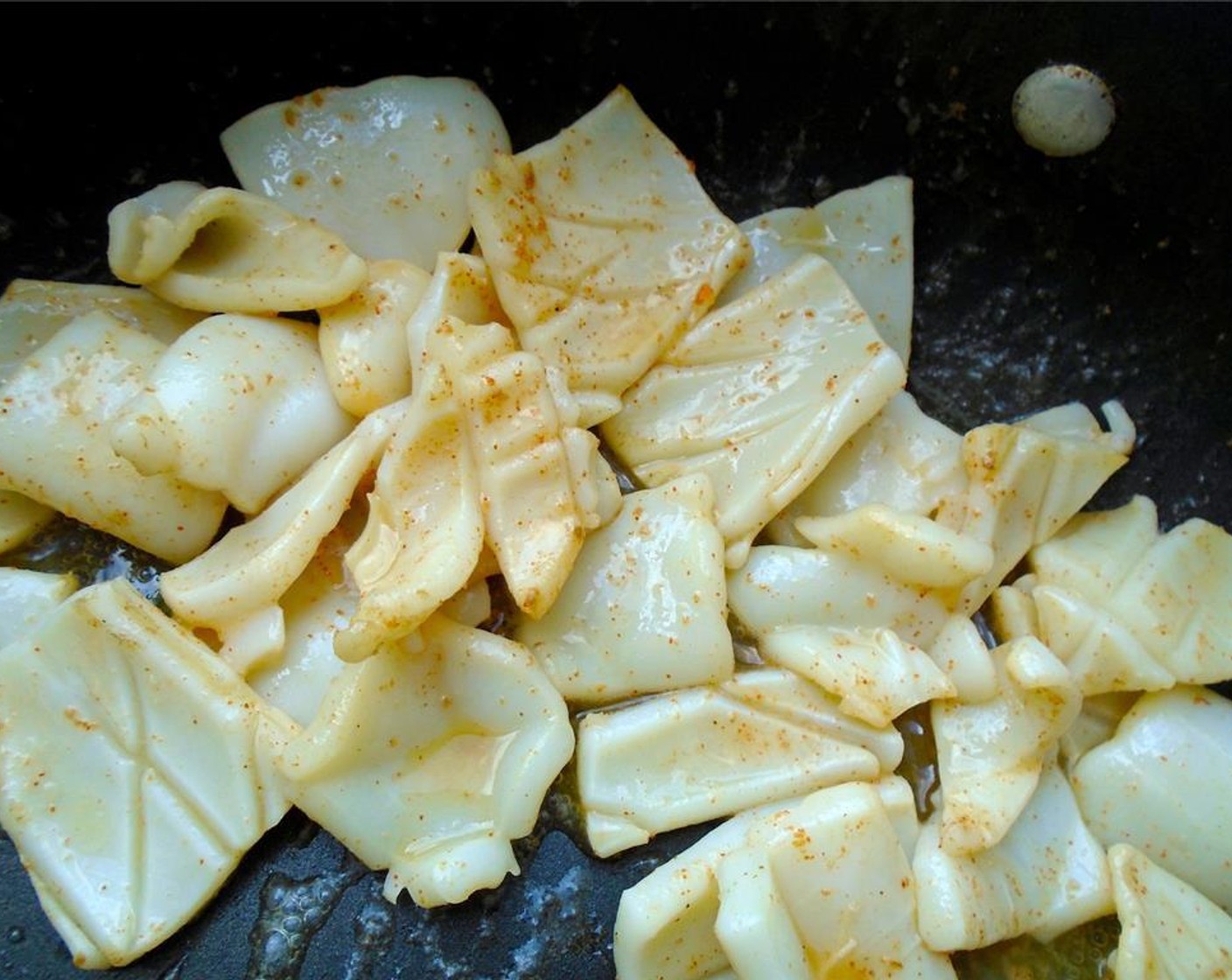 step 9 Stir fry squid in Peanut Oil (as needed) in a VERY hot pan for no more than 30 seconds, remove from the pan, and reserve.