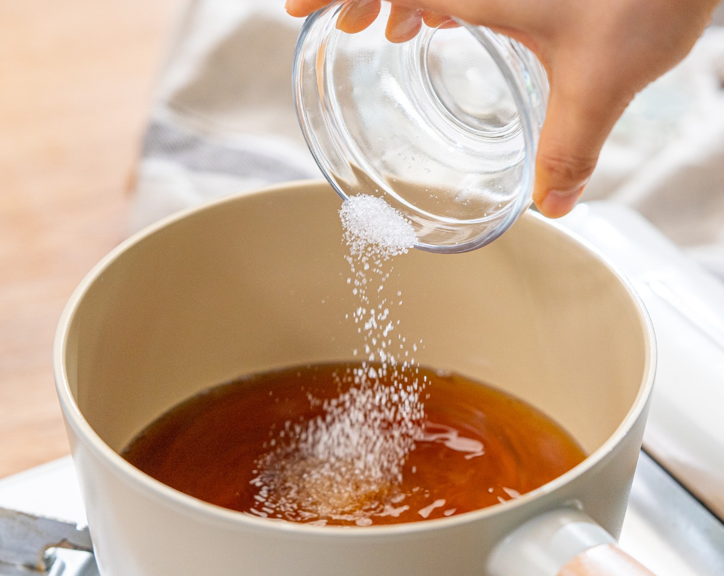 step 1 In a saucepan, mix Hondashi (1 tsp) and Water (3/4 cup), Soy Sauce (3 Tbsp), Mirin (3 Tbsp), and Granulated Sugar (1/2 Tbsp) over medium heat. Cook until the sugar has just dissolved. Set aside.