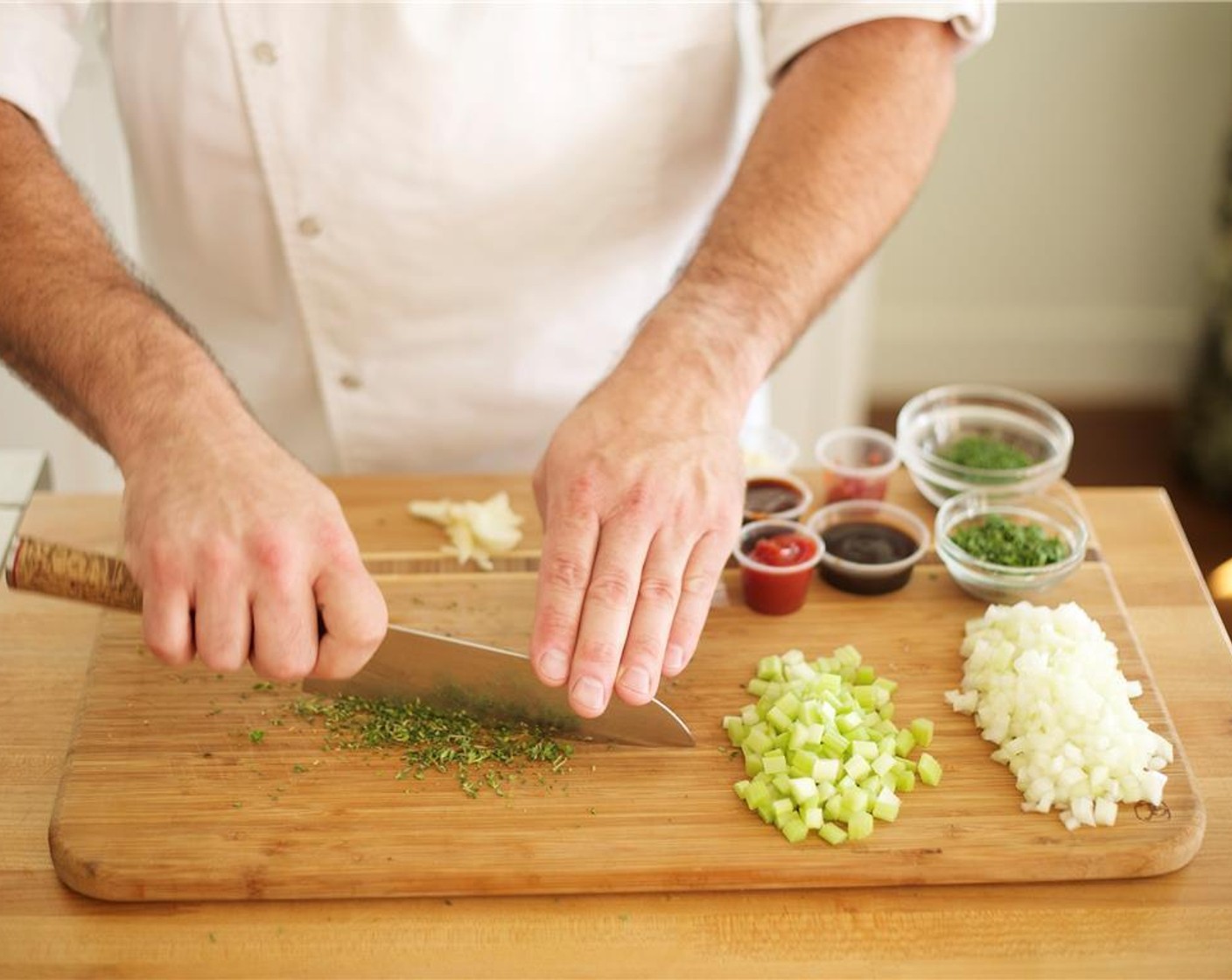 step 1 Preheat oven to 350 degrees F (180 degrees C). Dice the Onion (1) and Celery (2 stalks) into 1/4 inch pieces and place in large bowl. Remove the leaves from the Fresh Thyme (3 1/2 Tbsp), discard the stem and add leaves to onion and celery mixture.