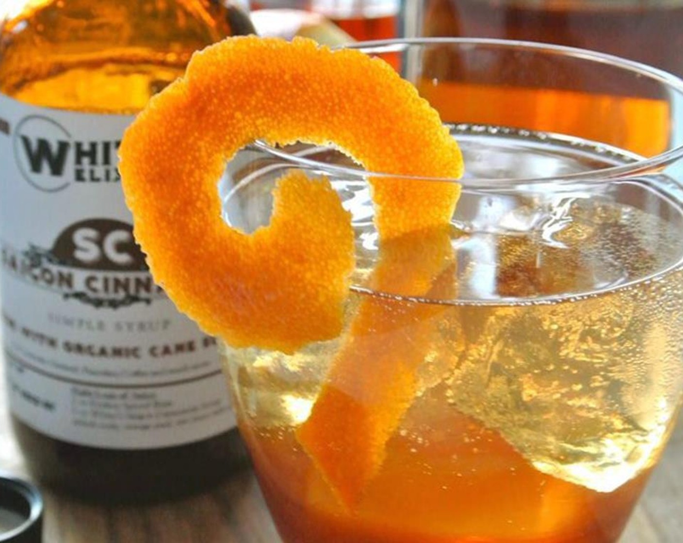 step 2 Strain into a fun glass over ice and garnish audaciously.