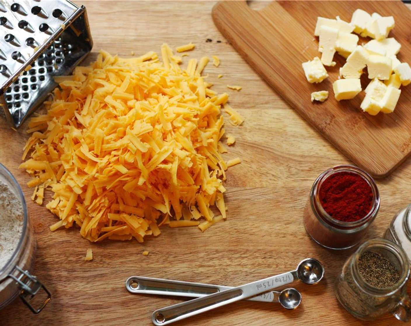 step 1 Grate the Sharp Cheddar Cheese (225 g). Cube the Unsalted Butter (4 Tbsp).