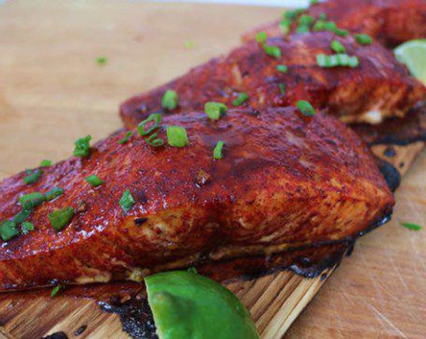 step 5 Brush each filet with Honey Balsamic reduction. Cook for an additional 10 minutes until salmon flakes. Remove from grill. Serve.