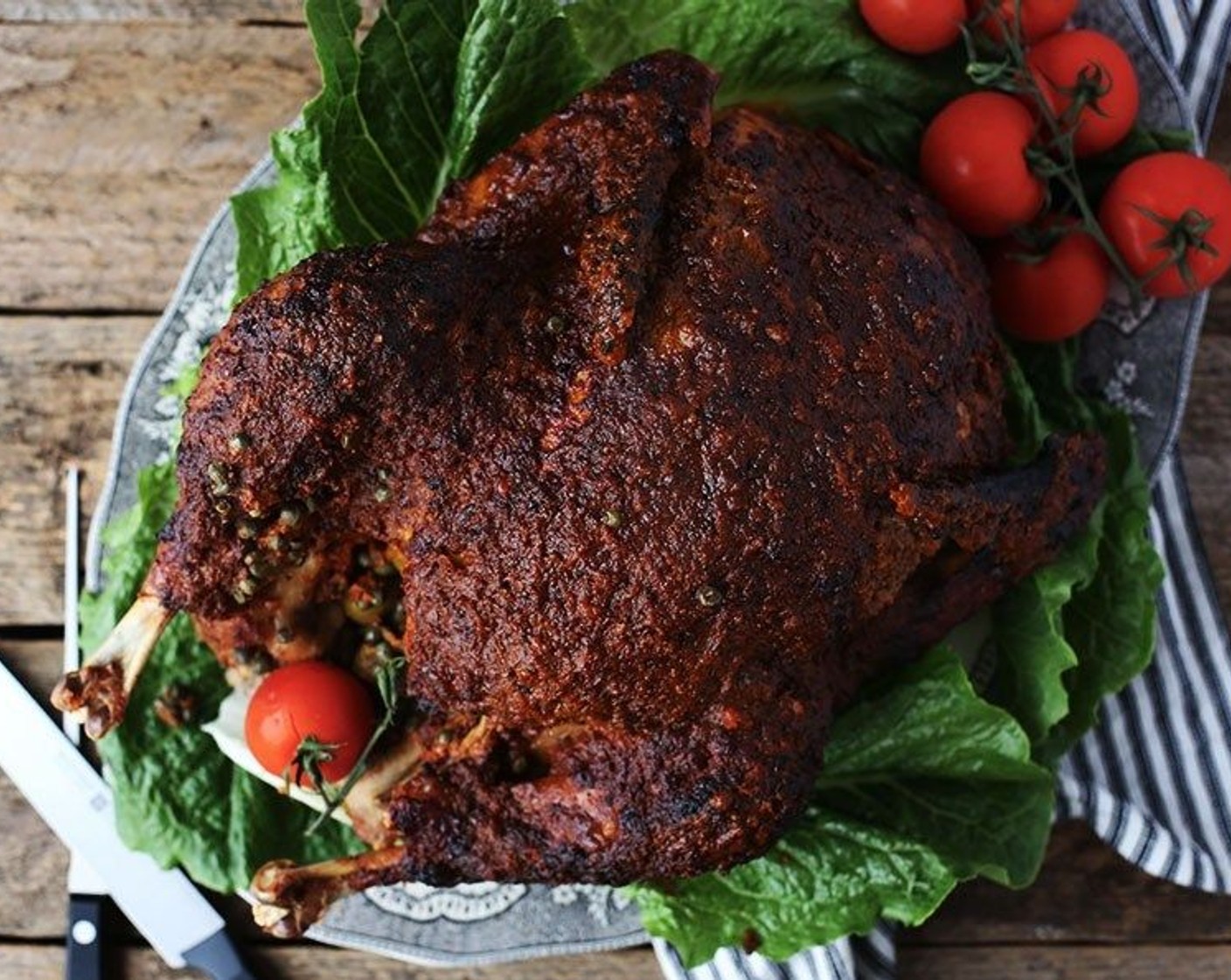 step 6 After the turkey has cooked, turn the oven down to 325 degrees F (160 degrees C) and pour the blended tomato sauce over the entire turkey.