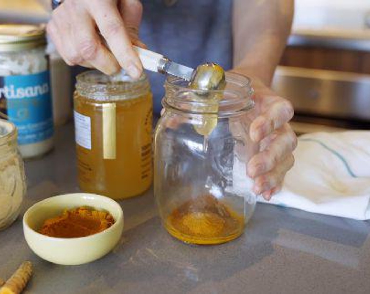 step 1 Place Ground Turmeric (1 tsp), Fresh Ginger (1 tsp), Ground Cinnamon (1/2 tsp) and Raw Honey (1 tsp) into a heat safe jar.