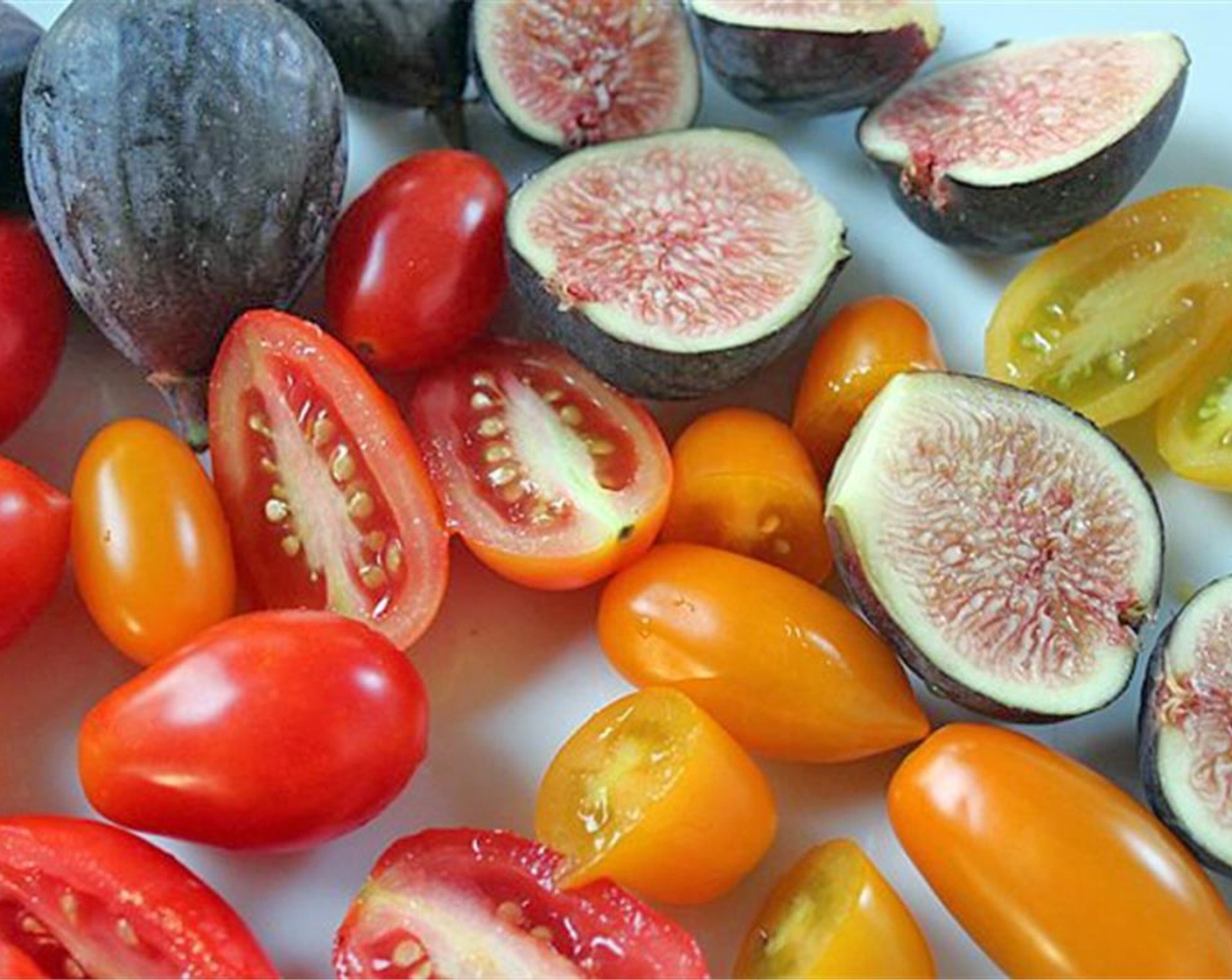 step 5 Bake for 20 to 25 minutes. Meanwhile, wash the Figs (6) and Cherry Tomato (1/2 cup) and cut in half.