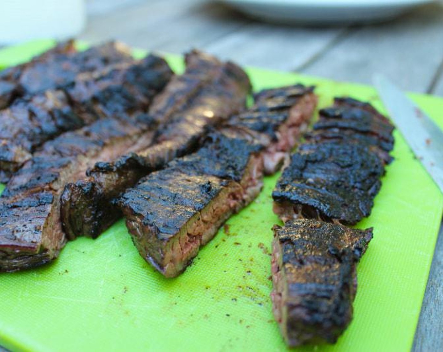 step 5 When ready to grill steak, prepare a charcoal fire with one layer of coals or set a gas grill to medium-high heat. Cook the skirt steak for 3 minutes on each side.