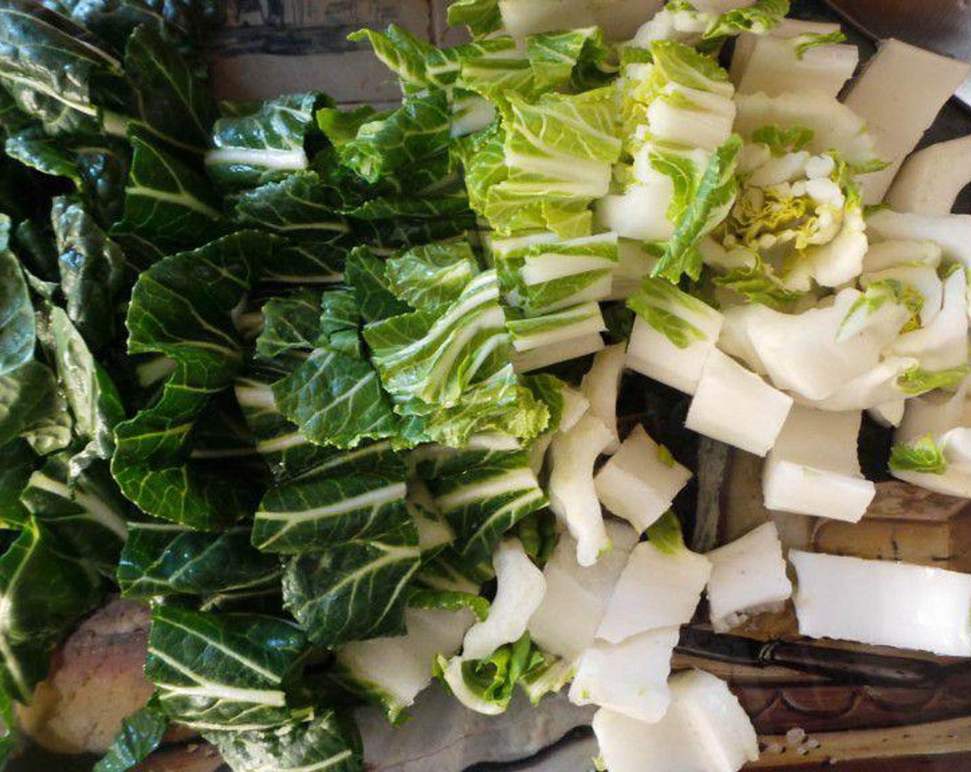 step 6 Rinse the Bok Choy (1 stalk) and cut off the stem. Starting with the white bottom, cut the bok choy into 1-inch pieces all the way to the leafy greens.