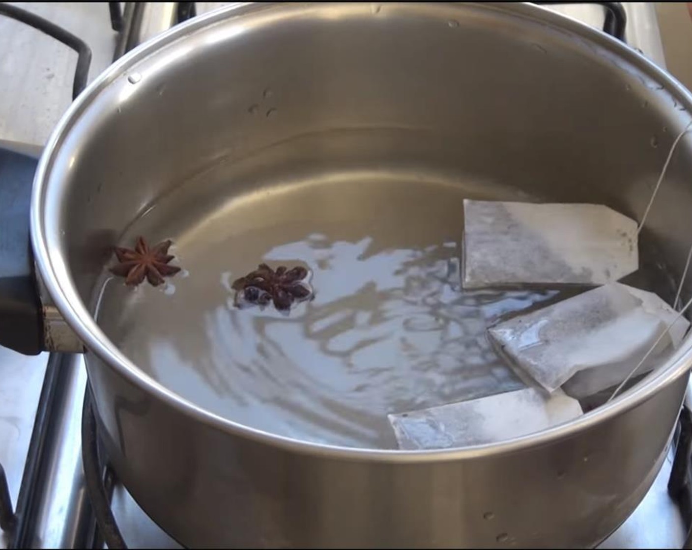 step 1 Place the Water (4 cups) in a pan and add the Granulated Sugar (1/3 cup), Star Anise (3), and Black Tea (5 bags). Stir until the sugar is completely dissolved, and boil for 10 minutes.