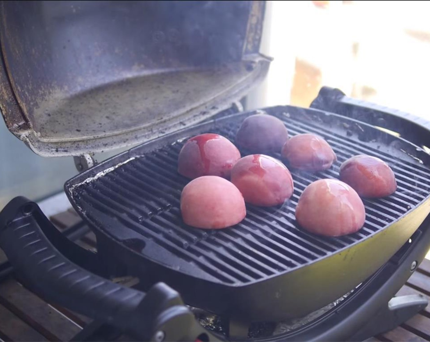 step 2 Rub Halloumi Cheese (4 slices) with oil. Heat up your grill, then grill peaches, cut side down for 5 minutes. Flip, then close lid, cooking 6-7 minutes more. Remove from grill, and set aside. Grill halloumi on high heat, flipping halfway through.