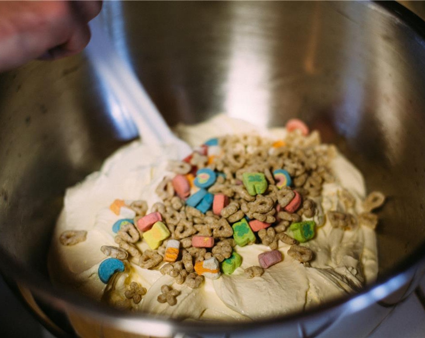 step 10 Transfer to a bowl and fold in the Lucky Charms® Cereal (3/4 cup).