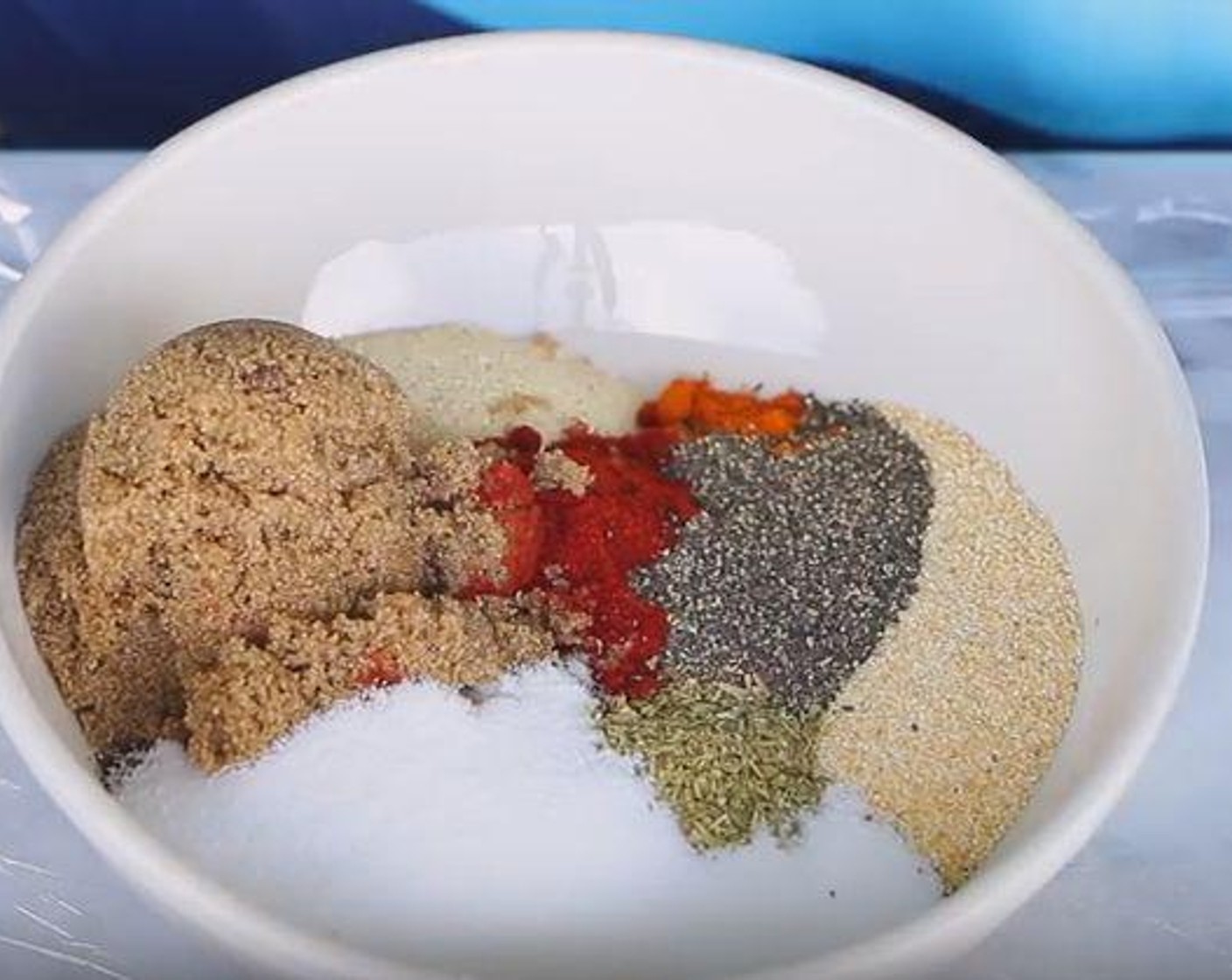 step 1 In a bowl, stir together the Dark Brown Sugar (3 Tbsp), Onion Powder (1 Tbsp), McCormick® Garlic Powder (1 Tbsp), Chili Powder (1 Tbsp), Dried Oregano (1 Tbsp), Paprika (2 Tbsp), Ground Black Pepper (1 tsp), Cayenne Pepper (1 tsp), Salt (2 1/2 Tbsp).