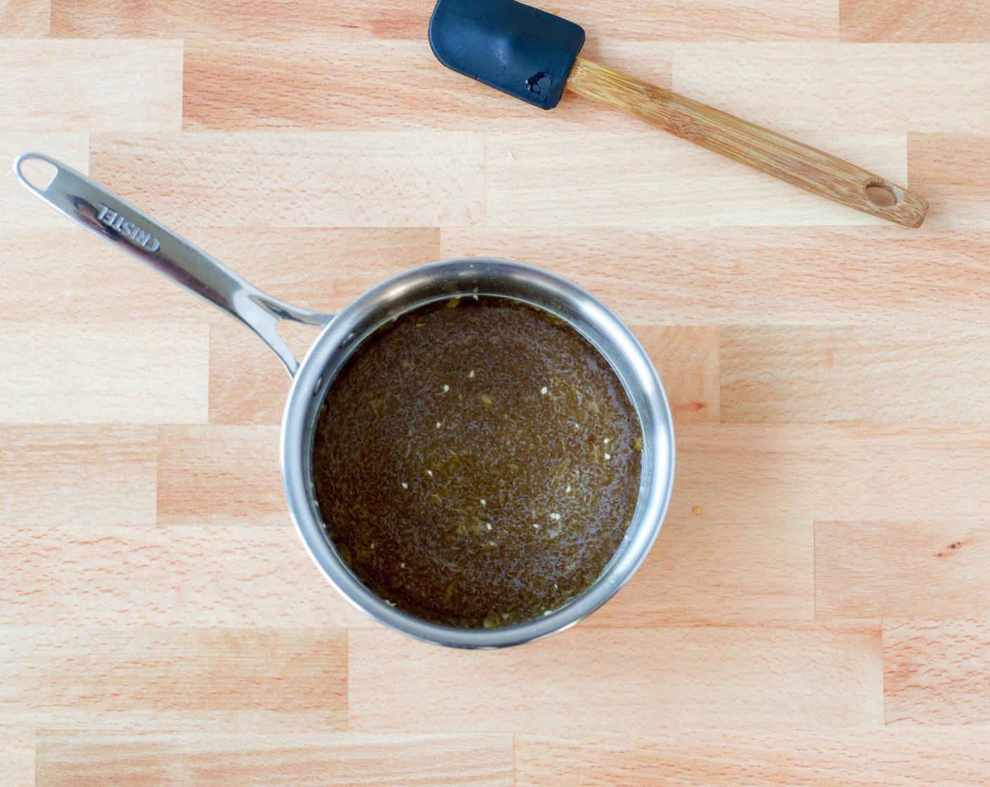 step 3 While the rice is cooking, make the glaze for the salmon: combine the juice from the Orange (1), Honey (3 Tbsp), Soy Sauce (2 Tbsp), the remaining ¾ teaspoon of Salt (1/2 tsp) and Freshly Ground Black Pepper (1/2 tsp) in a small saucepan and bring to a boil over high heat. Boil until syrupy and reduced by half, 5 to 7 minutes.