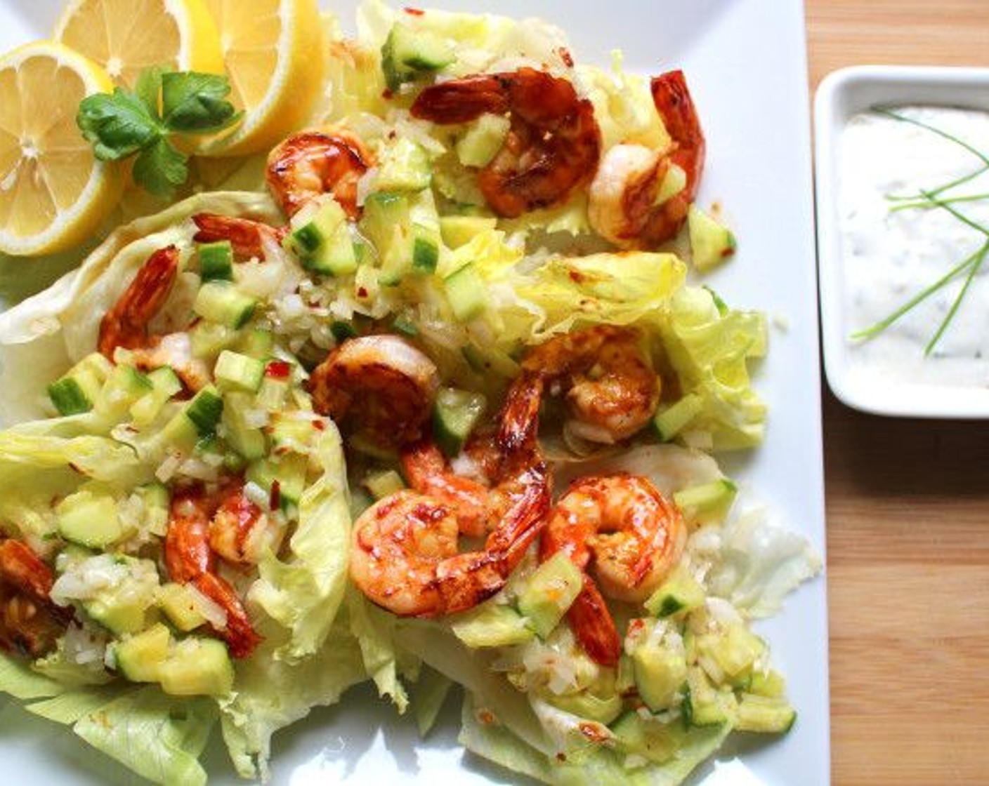 step 4 Spread some Iceberg Lettuce (to taste) on a serving plate. Drizzle with Vinaigrette (to taste), and top with the shrimp and salsa before serving.