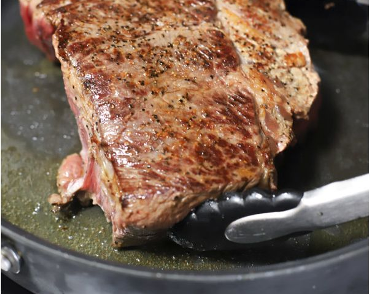 step 2 Place meat inside a large roasting pan and set aside. Preheat oven to 350 degrees F (180 degrees C).