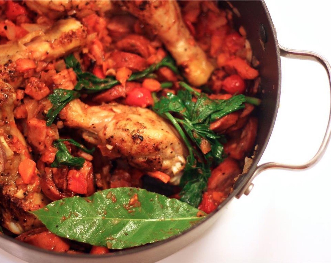 step 6 Sweat the vegetables until the onions is translucent and add the Tomatoes (2) then cook for a few additional minutes. Re-introduce the meat to the pot, and stir in the Tomato Paste (1/4 cup).