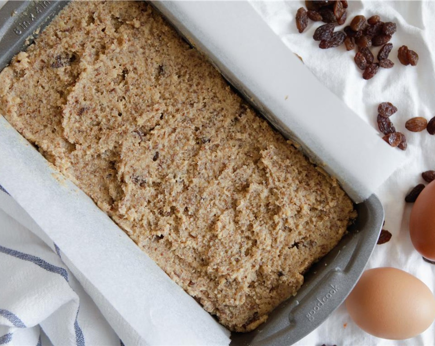 step 6 Spoon into lined loaf pan and even out the surface.