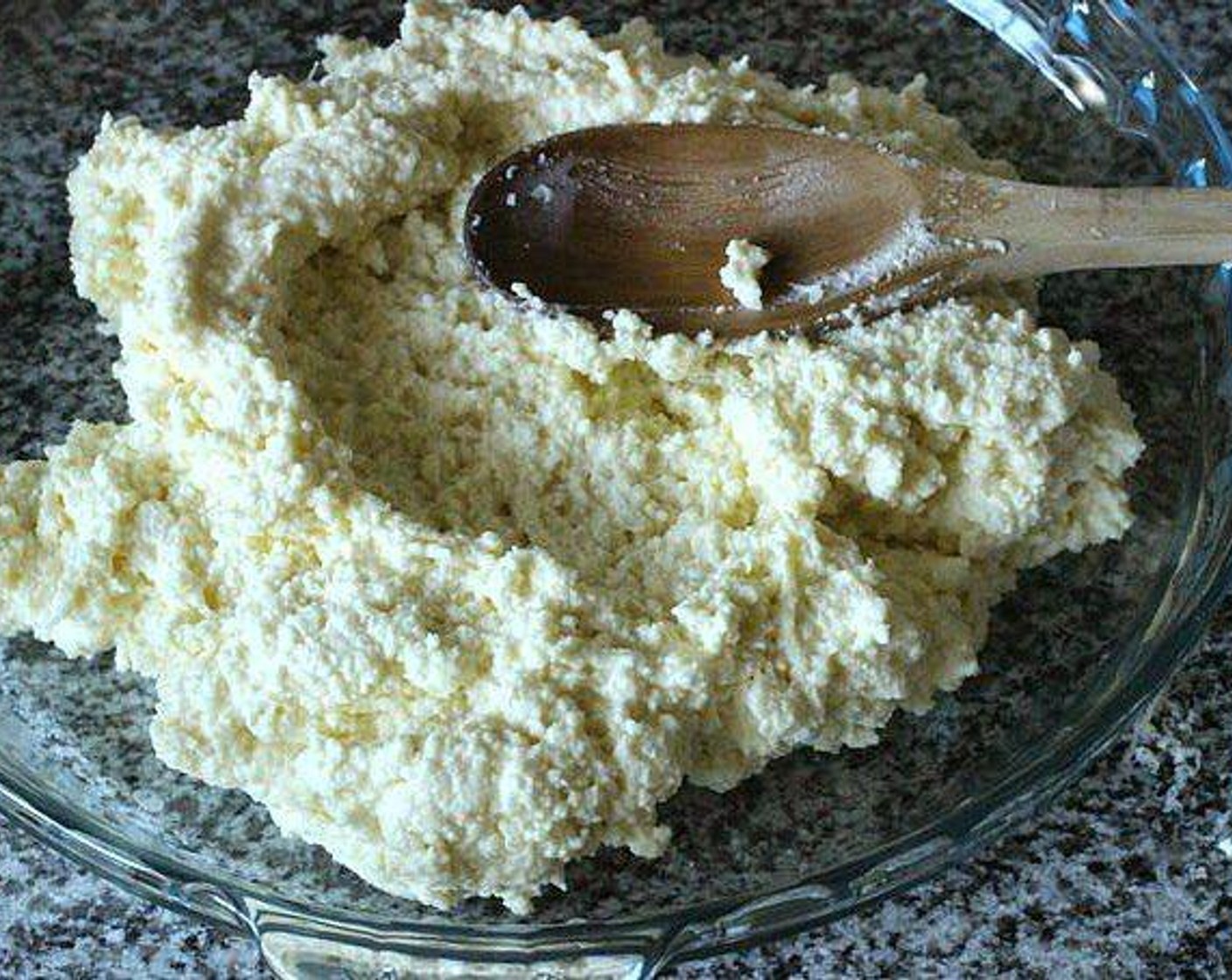 step 4 In a bowl, mix Ricotta Cheese (2 cups) with Eggs (2), Salt (1/2 tsp), Ground Black Pepper (1/2 tsp), and Parmesan Cheese (1/3 cup). Mix well with a hand beater or wooden spoon.