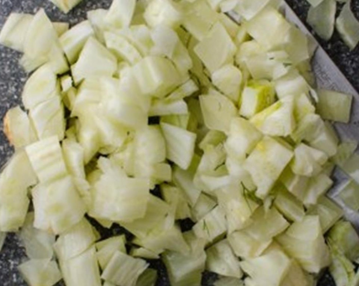 step 3 Meanwhile, heat Olive Oil (2 Tbsp) in a large skillet over medium-low heat. Add sliced Fennel Bulb (1) and stir. Cover tightly with lid and let simmer, stirring occasionally about 8-10 minutes, until fennel is softened and slightly translucent.