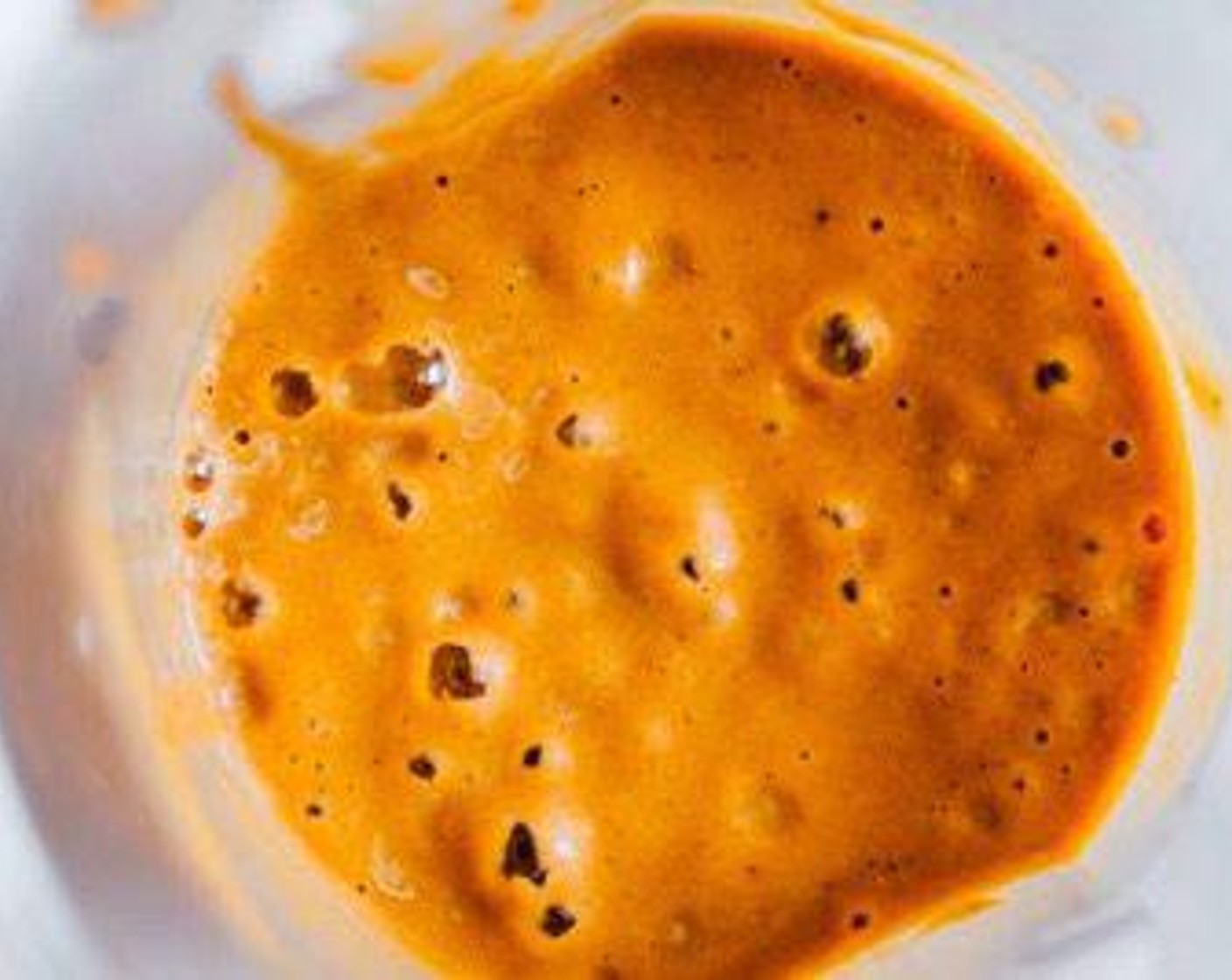 step 1 Blend Canned Pumpkin Purée (1/2 cup), Milk (1/2 cup), Coffee (1/2 cup), Banana (1), Maple Syrup (2 Tbsp), Ground Cinnamon (1 tsp), Ground Ginger (1/4 tsp), Ground Nutmeg (1/4 tsp), Ground Cloves (1 pinch), and Ground Allspice (1 pinch) until smooth.