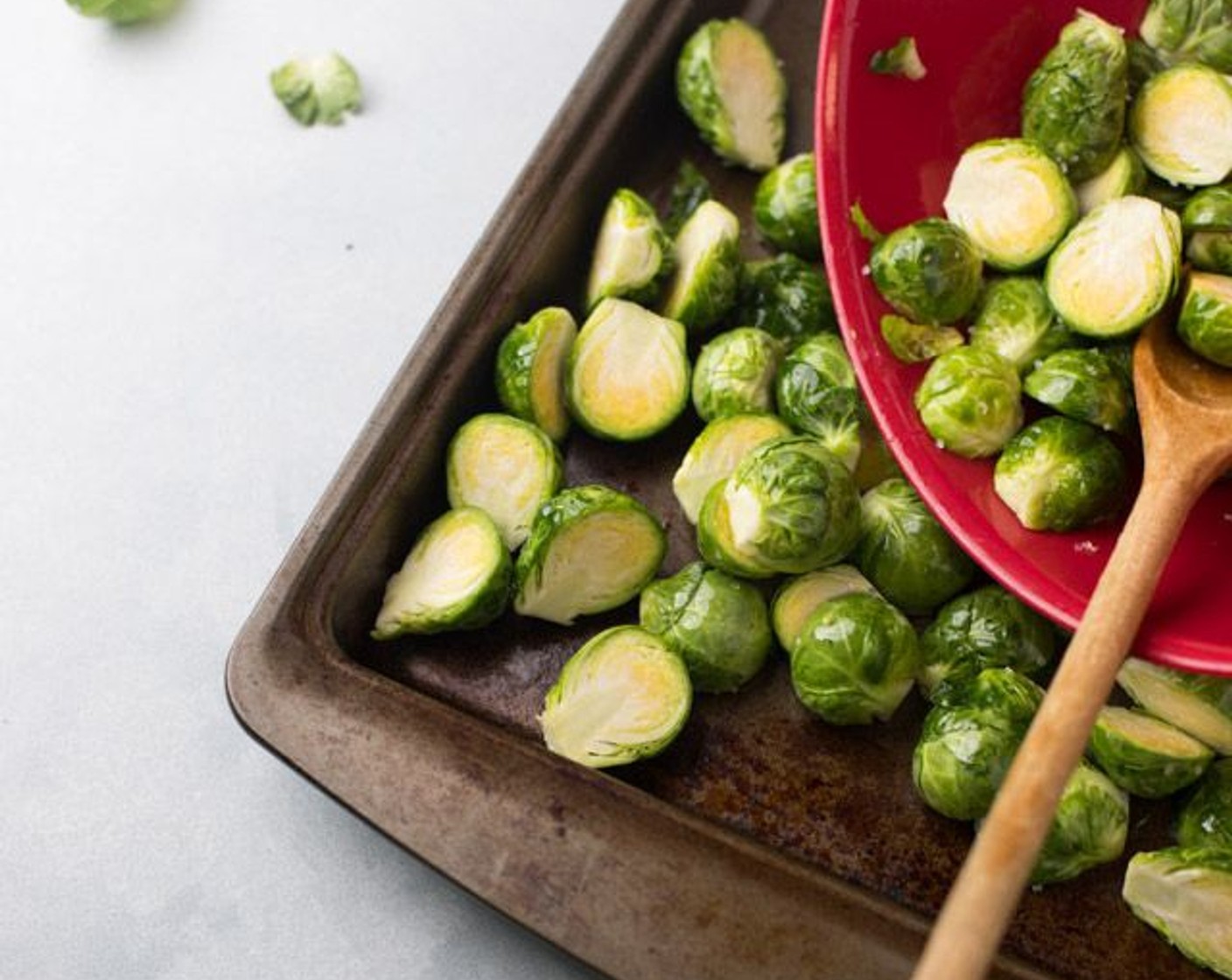 step 4 Place brussels sprouts on a baking sheet and bake at 375 degrees F (190 degrees C) for 25 minutes, stirring every 5-10 minutes.