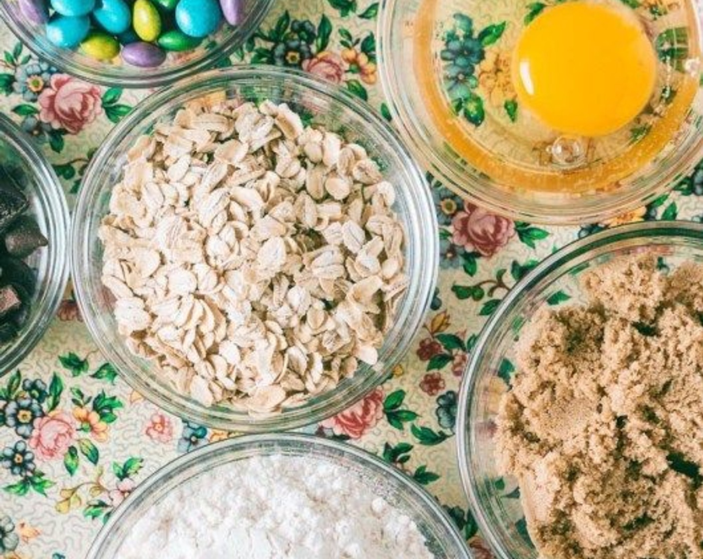 step 4 Add the Quick Cooking Oats (1/2 cup), All-Purpose Flour (1 cup), Baking Powder (1/2 tsp), Ground Cinnamon (1/4 tsp), and mix until incorporated. Fold in the Chocolate Chunks (1/2 cup), M&M's® Milk Chocolate Candy (1/2 cup), and Peanuts (1/4 cup).