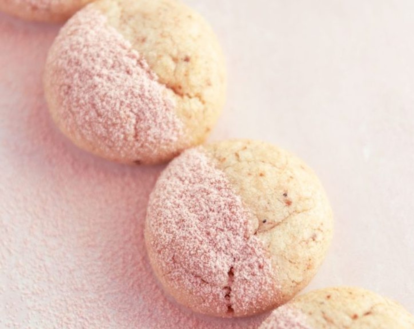 step 9 Cool on the tray for 10 minutes. Dust each cookie with the strawberry powdered sugar mixture. Feel free to use a stencil to make pretty designs!