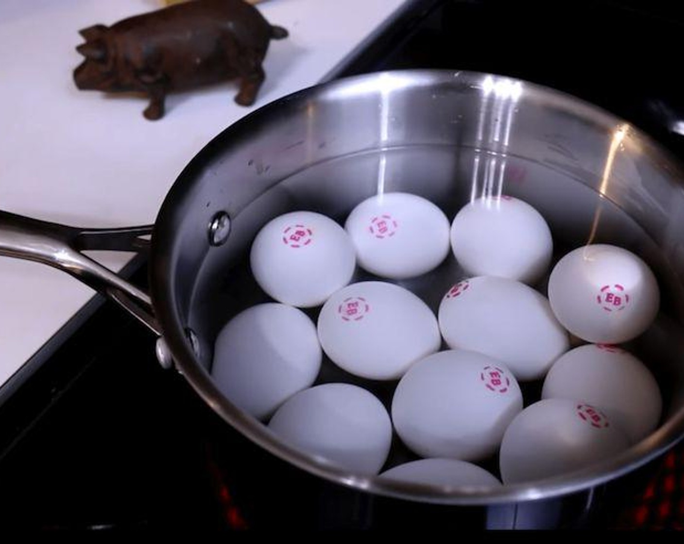 step 1 Place Eggland's Best Classic Eggs (12) in a single layer in the bottom of a large pot. Add enough cold water to cover the eggs 1”. Bring the pot to a boil over medium high heat. Turn the burner off once a boil is reached and cover the pot. Set a timer for 10 minutes for hard boiled eggs.