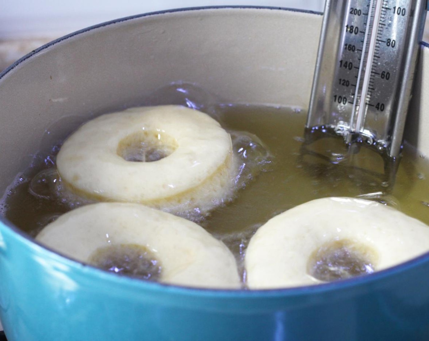 step 12 Cook the doughnuts in batches, around 30 seconds on each side, until golden brown.