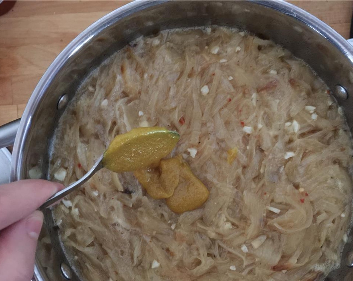 step 10 Once boiling, add in the Chicken Base (1/4 cup) and stir. Simmer for 30 minutes and remember to stir.