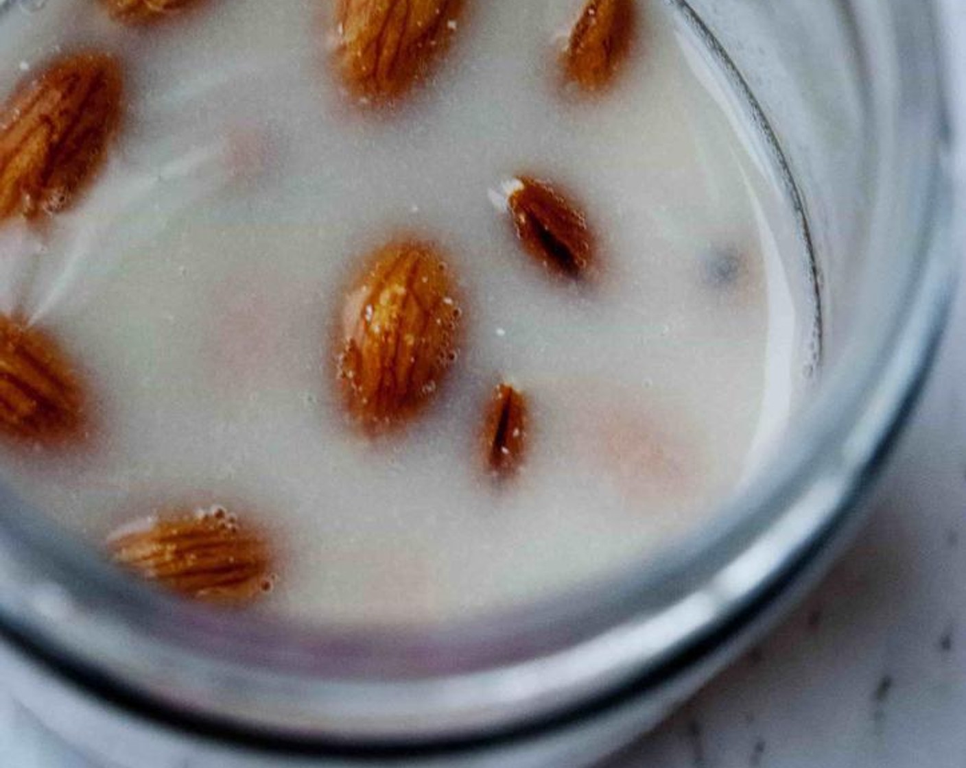 step 1 Take some Live Kefir Grains (2 Tbsp). Wash the Raw Almonds (1 cup) and place them in a jar with the Water (3/4 cup) and kefir. Give it a stir.