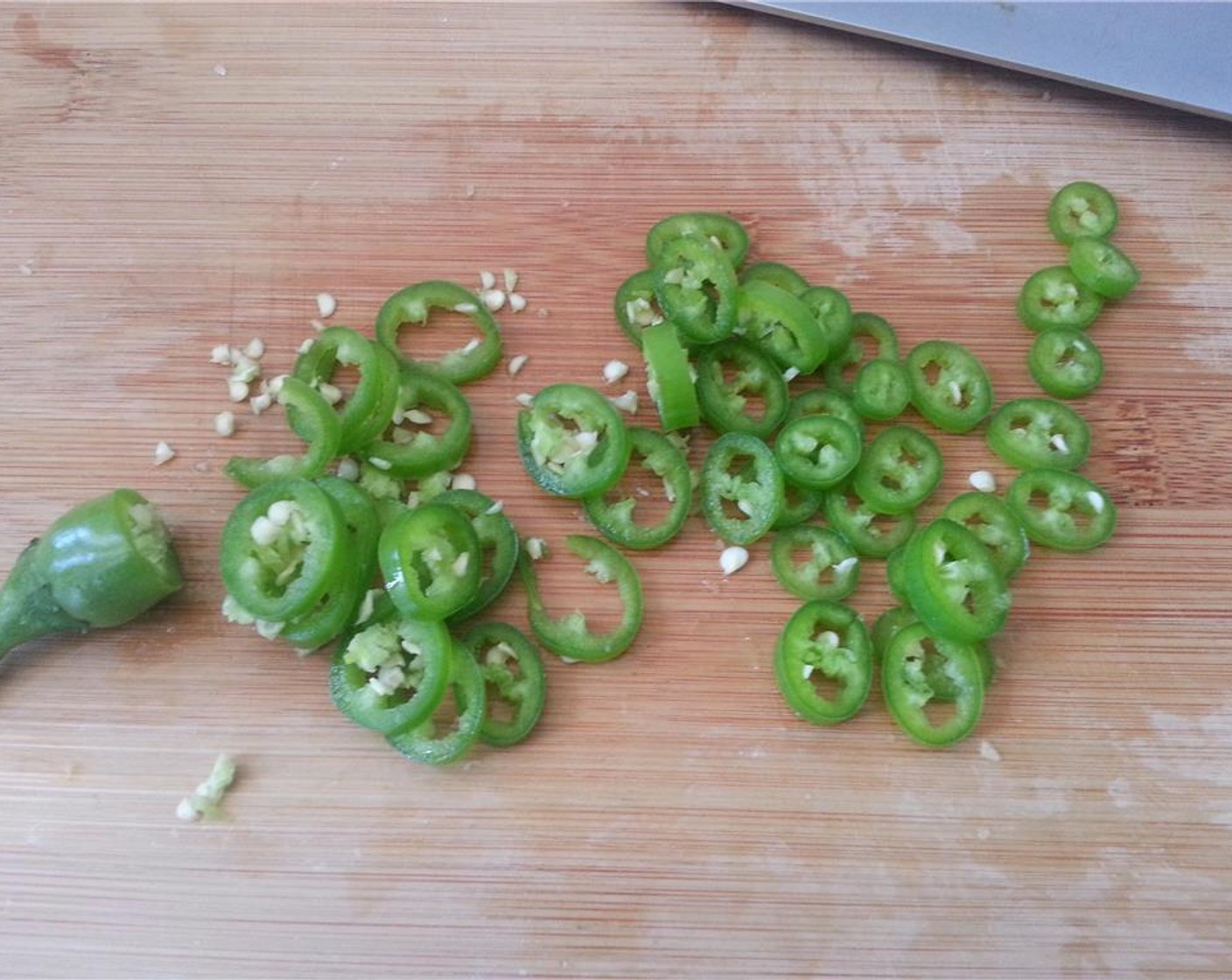 step 2 Thinly slice the Serrano Chilis (2).