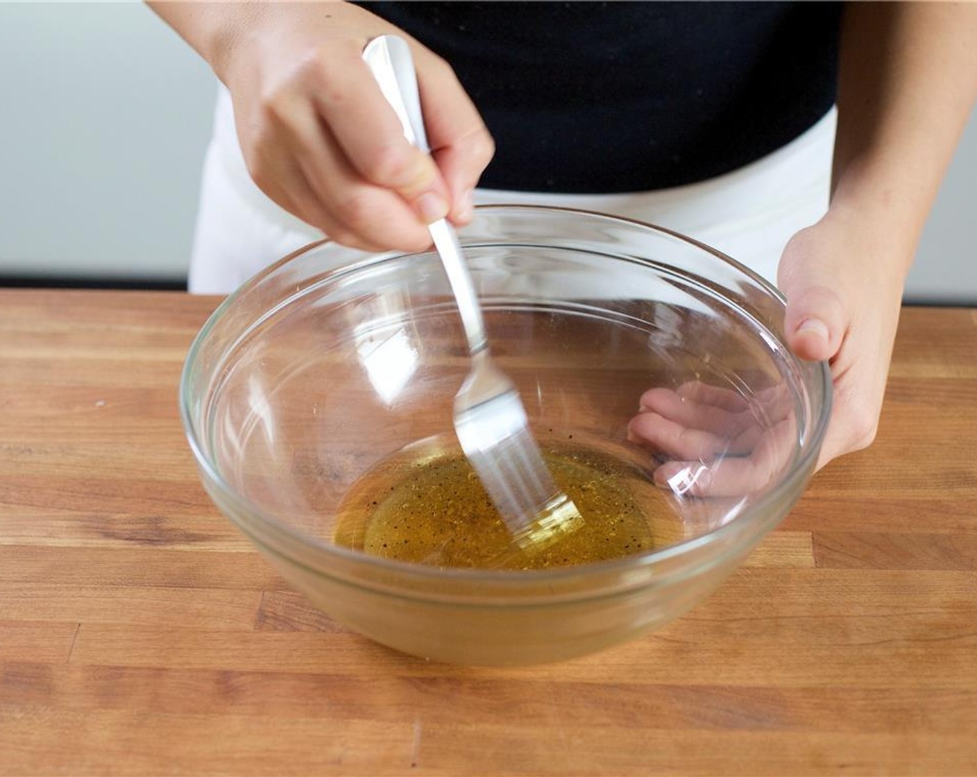 step 9 Drizzle in Olive Oil (1 Tbsp) while whisking to create your vinaigrette, and set aside.