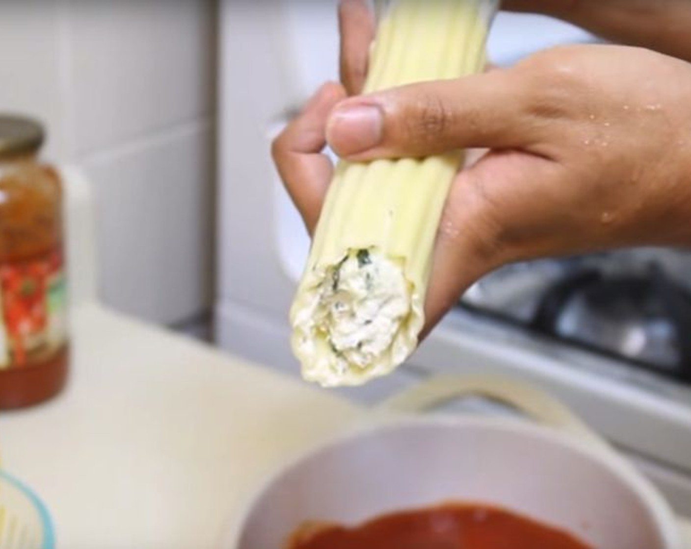 step 5 Take a piping bag and fill in the mixture. Pour the filling in the manicotti. Continue with the rest.