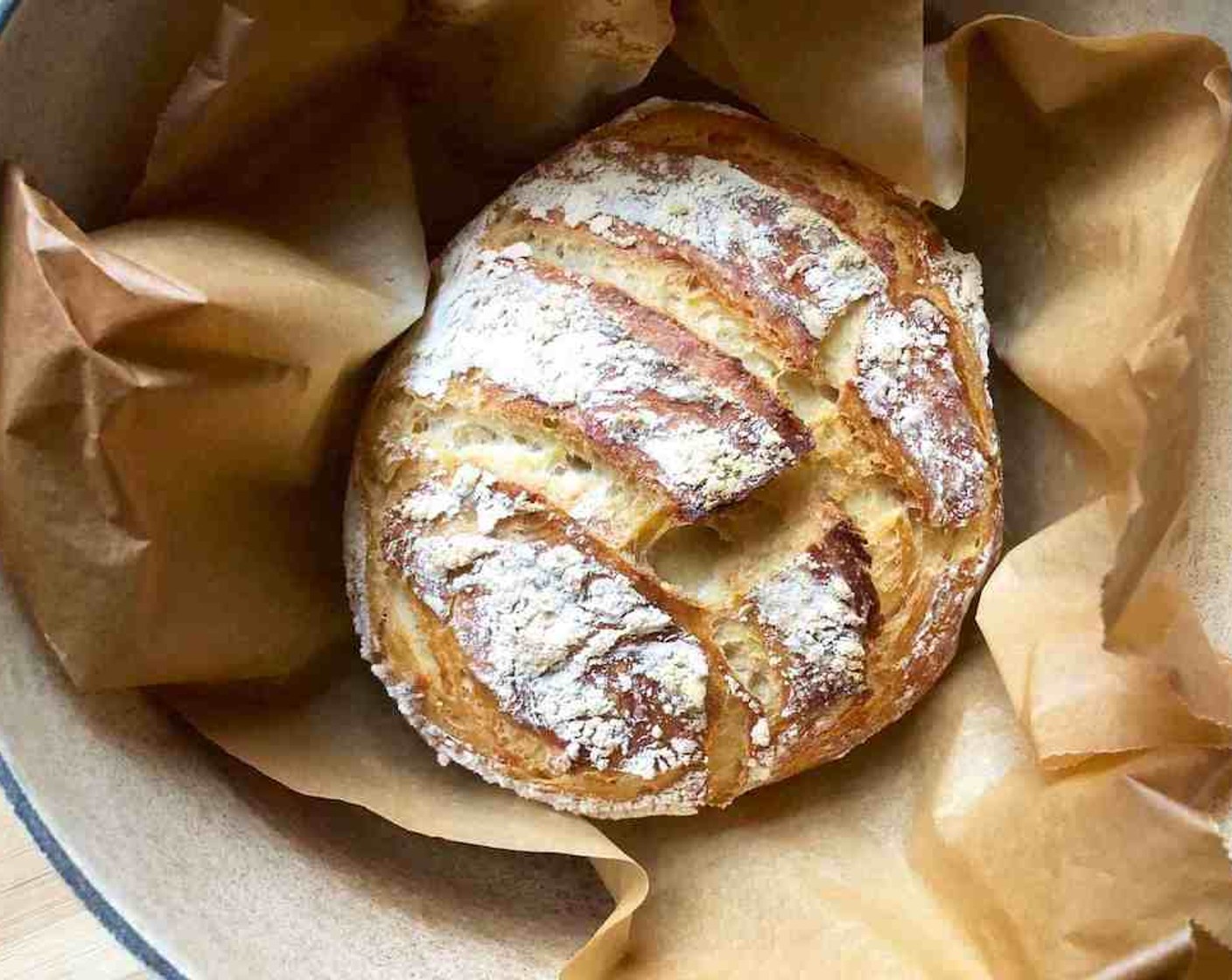 step 16 Bake the bread for a total of 30 to 35 minutes until the crust is browned to your liking and is firm to the touch. Remove the lid after the first 20 to 25 minutes and continue to bake uncovered until the crust is richly browned.