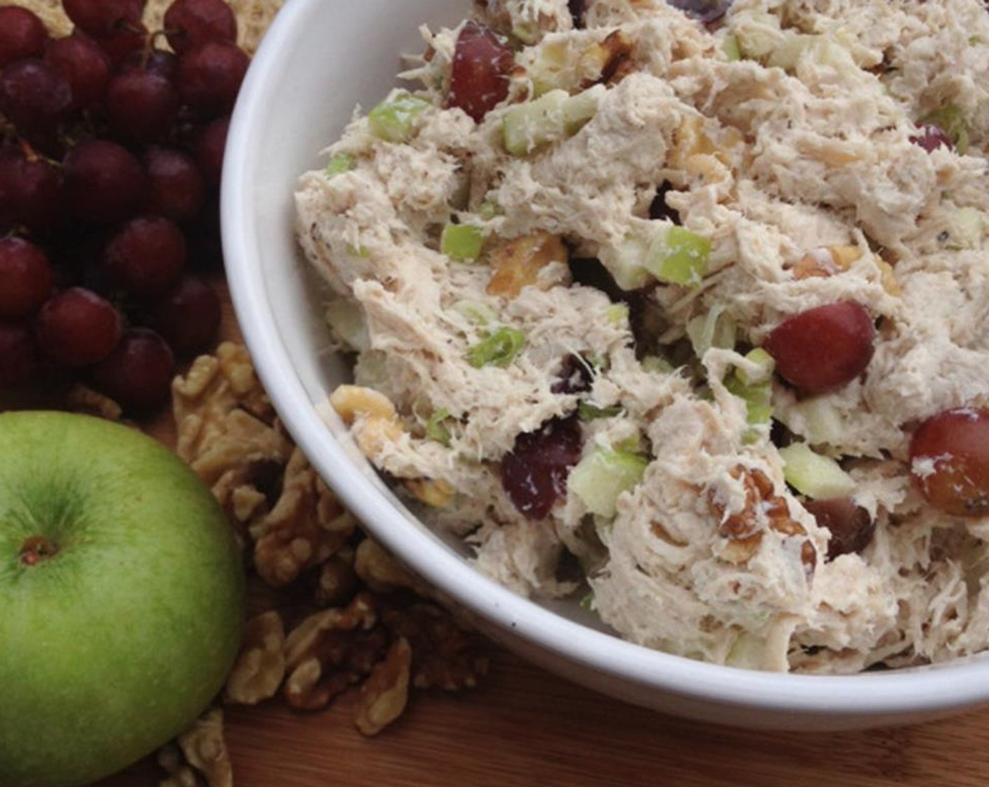 step 8 In the mixing bowl with the shredded chicken, add the Nonfat Plain Greek Yogurt (1 cup) and Mayonnaise (2 Tbsp). Turn on low and mix until incorporated. Add Salt (to taste) and Ground Black Pepper (to taste).