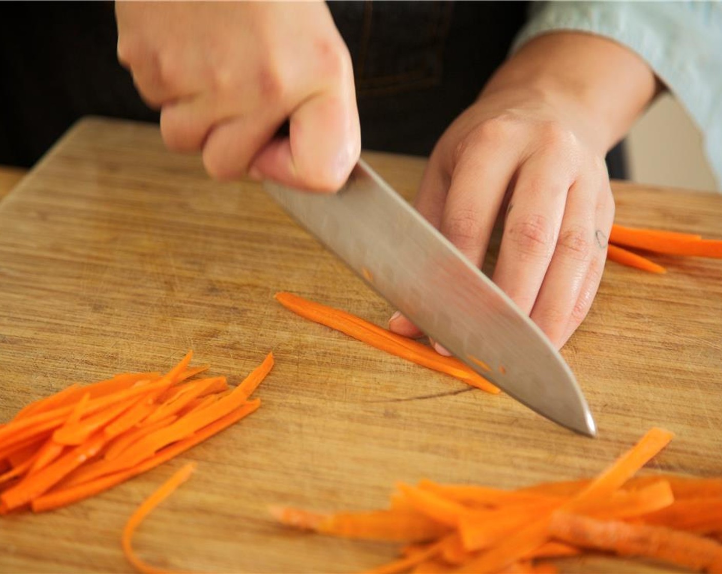 step 3 Peel Mango (1). Carefully cut off flesh around the pit on all four sides and discard pit. Dice flesh into quarter inch pieces and add to bowl. Peel and cut the Carrot (1/4 cup) into matchsticks.