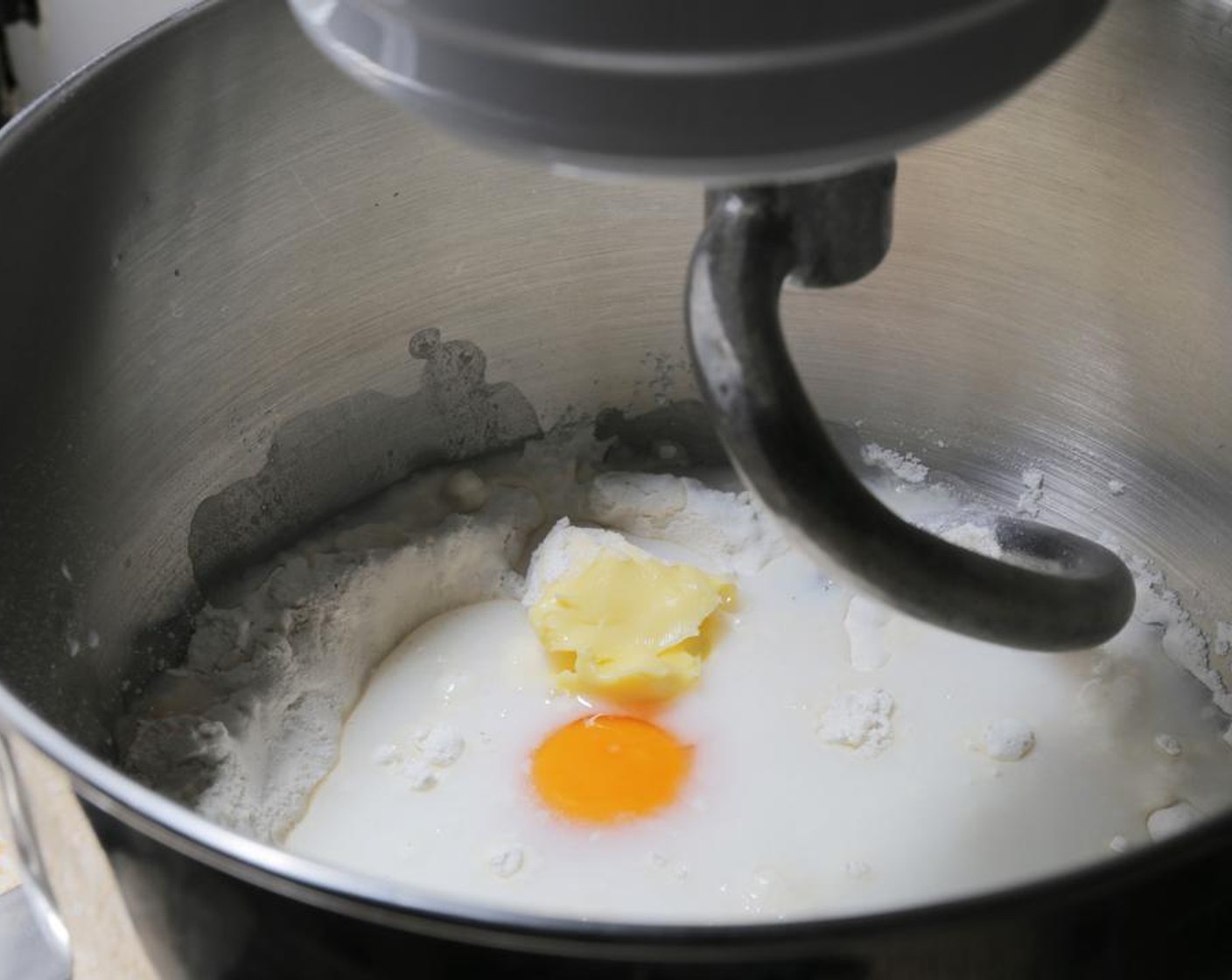 step 2 Add the Granulated Sugar (1 2/3 Tbsp), Salt (2 tsp), Water (6.5 oz), Farmhouse Eggs® Large Brown Egg (1), Unsalted Butter (3/4 cup), and Milk (2 oz).