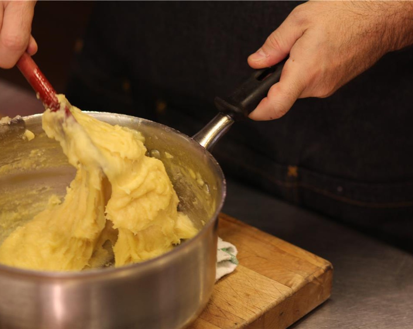 step 4 In a bowl, beat Eggs (4) and add to the dough in two batches, stirring vigorously between addition until the egg are completely incorporated and the pastry is smooth. The dough should be glossy and slowly hang from the spoon in thick ribbons.