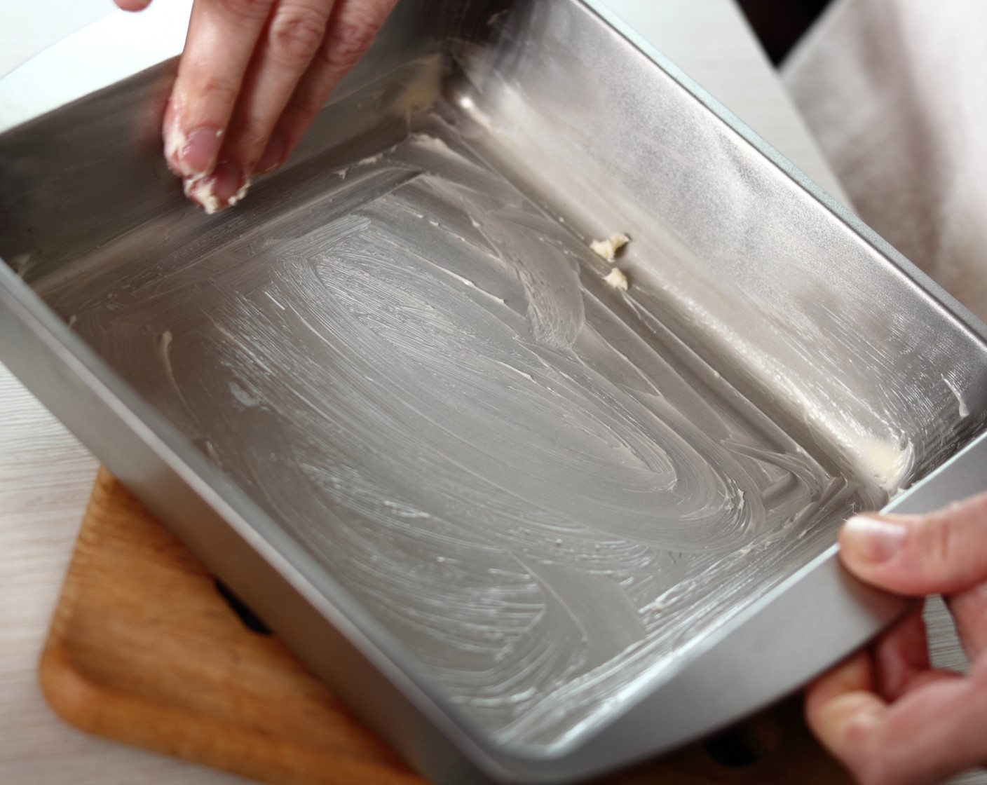 step 2 Grease and line a 9×5-inch loaf pan with parchment paper, and set aside.