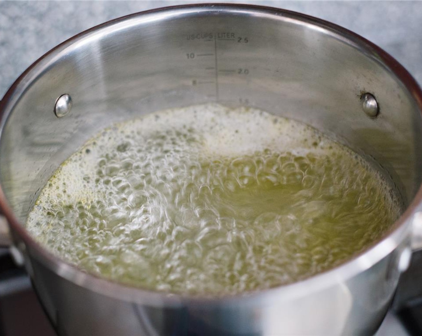 step 1 Bring the Water (4 cups), Salt (1 Tbsp) and Salted Butter (2 Tbsp) to a boil in a large pot.