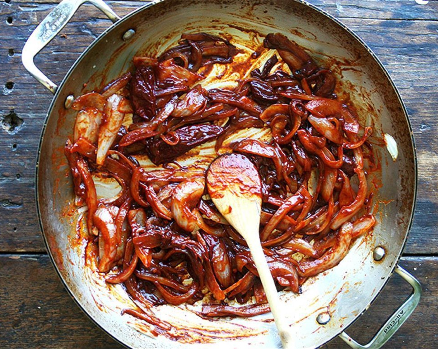 step 4 Add Chipotle Peppers in Adobo Sauce (1 can) including 2-3 of the chilies. Stir until the onions are nicely coated in the sauce.