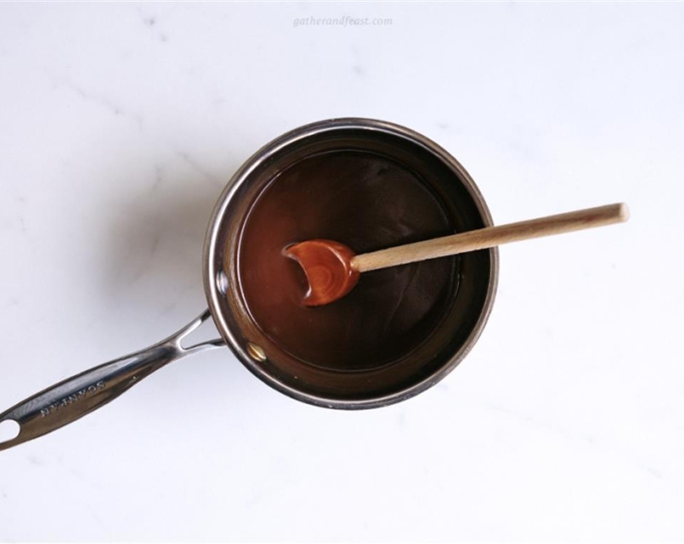 step 2 Simmer for about 5 minutes or until the caramel becomes thick and coats the back of the spoon.