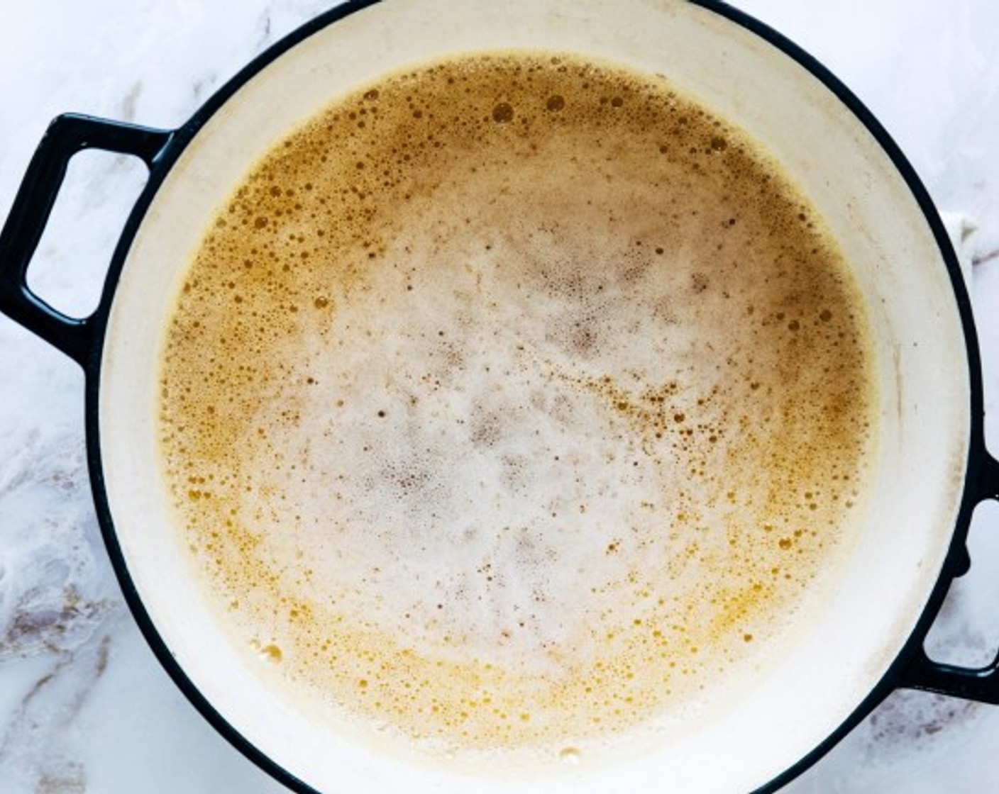 step 3 Once the butter has developed a deep golden brown color, pour into a heatproof glass container and set aside