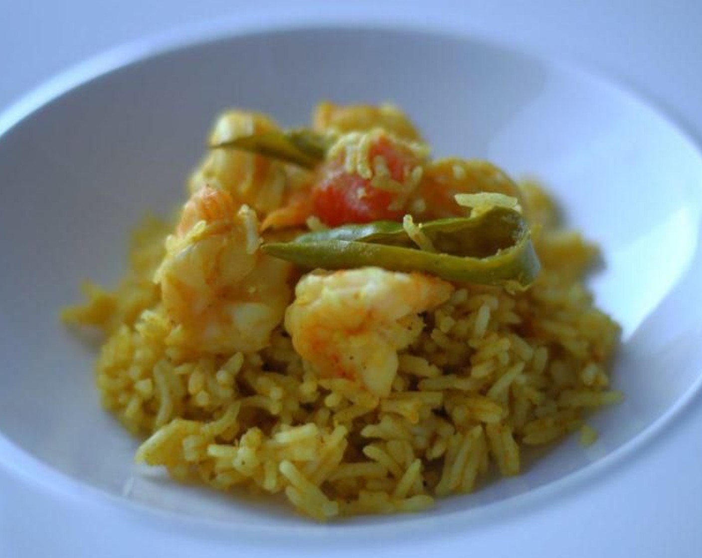 step 9 Serve by spooning the rice onto a plate and topping with the shrimp and peppers. Enjoy!