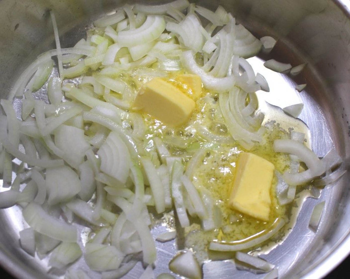step 1 Start by sautéing Onion (1) in Salted Butter (1/2 cup) until translucent.