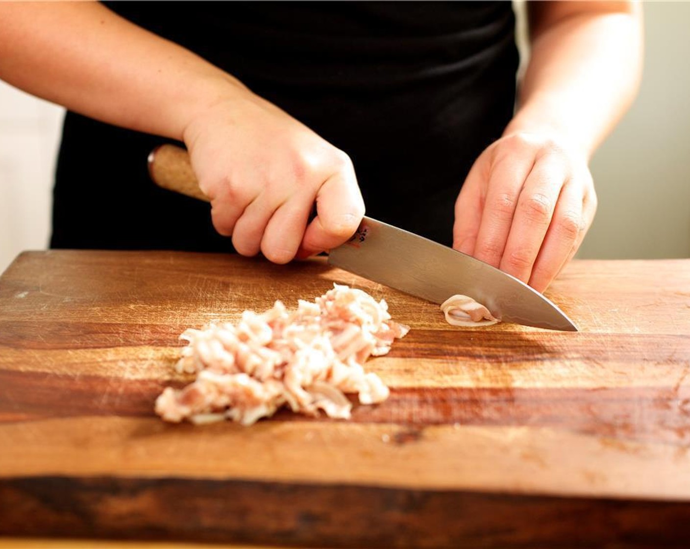 step 4 Mince Fresh Chives (6 stalks) and set aside. Slice the Garlic (8 cloves) very thinly and set aside. Cut the Pancetta (1/3 cup) into quarter inch pieces, and set aside.