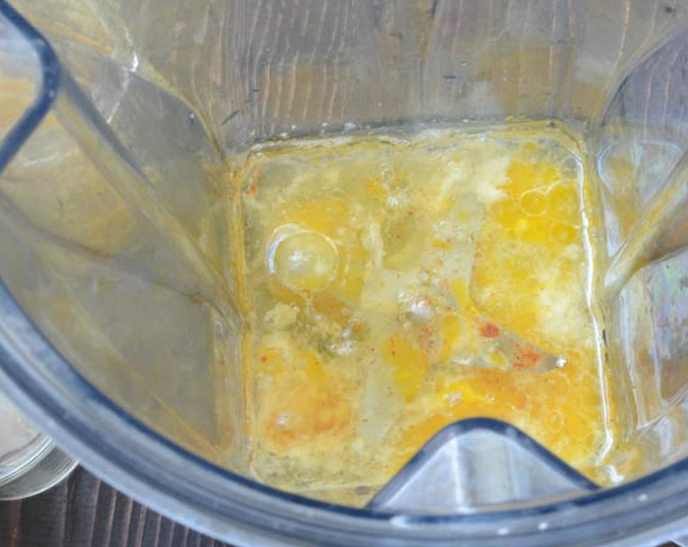 step 1 Into a blender add the Egg (1), Dry Mustard (1/2 tsp), Salt (1/4 tsp), Granulated Sugar (1/2 tsp), juice from Lemon (1), Cayenne Pepper (1 dash) and Vegetable Oil (1/3 cup).